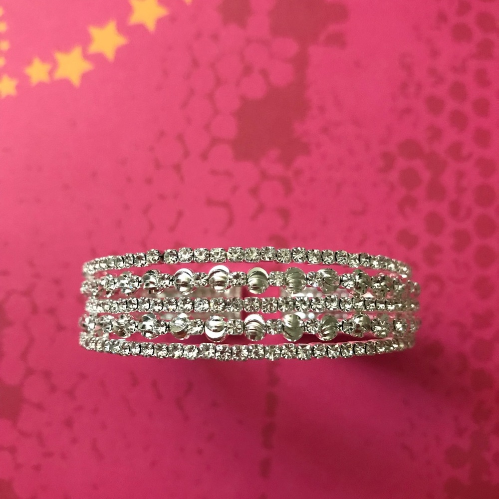 Crystal and silver tone ball bangle